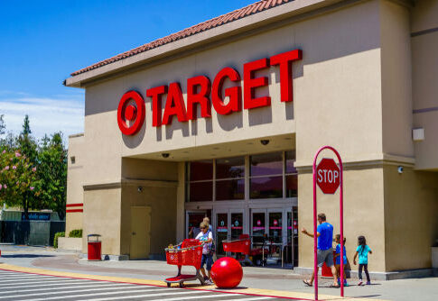 Entrance of a Target store with shoppers and shopping carts