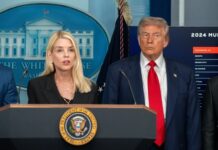 Backroom Deal? Trump Dials Putin, Zelenskyy Two government officials at a press conference in front of the White House backdrop